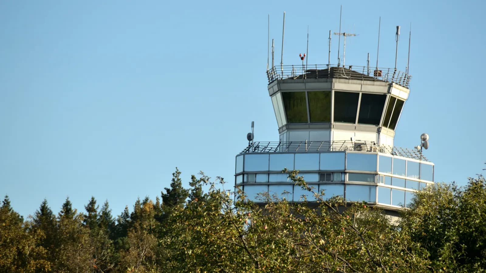 Airport control tower, representing aviation-authority interpreting