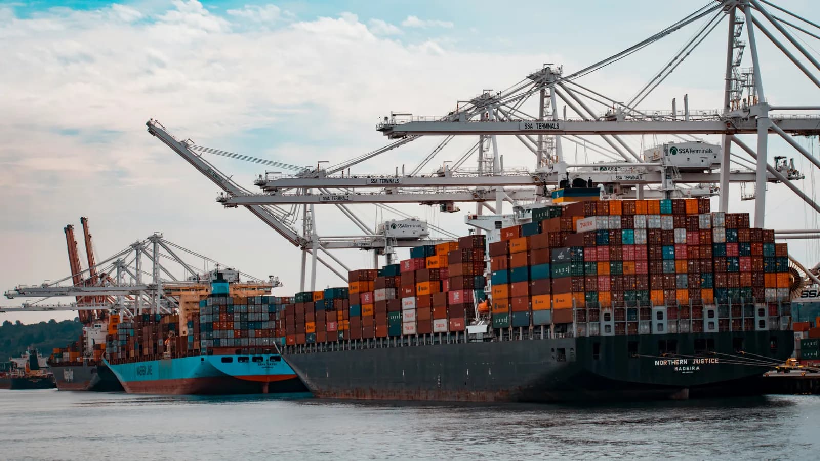 Shipping containers at a port, representing maritime interpreting