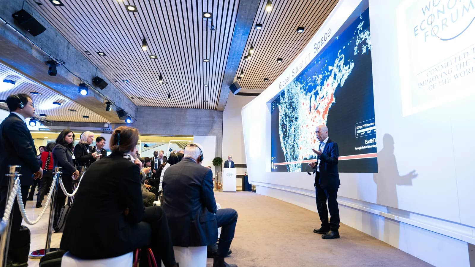 Briefing room with a presenter, representing diplomatic interpreting
