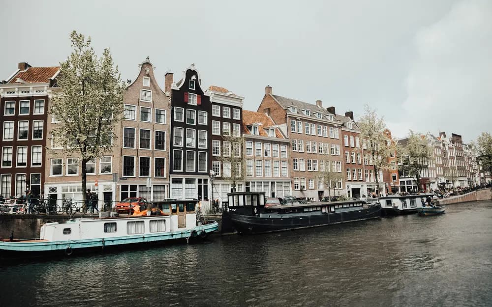 Historic canal houses along an Amsterdam canal