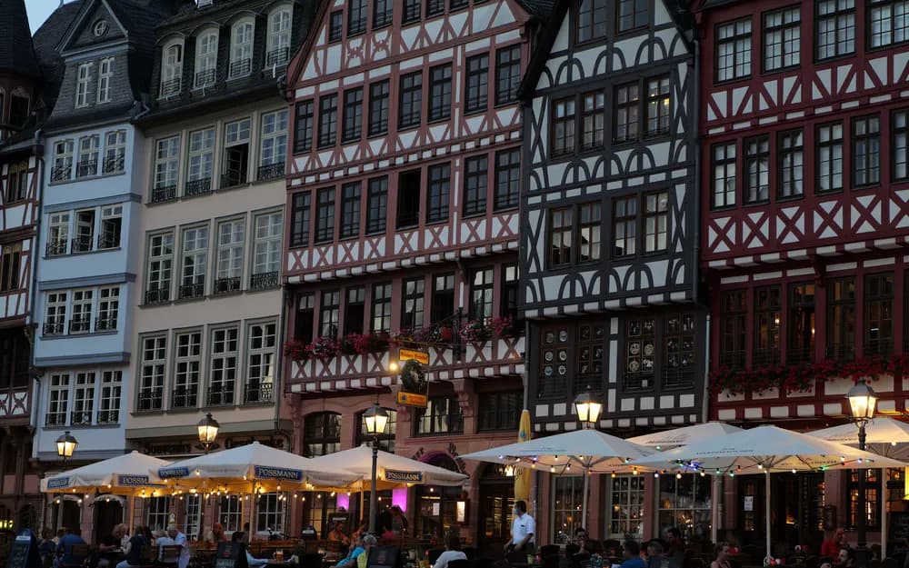Half-timbered houses on the Römerberg square in Frankfurt in the evening