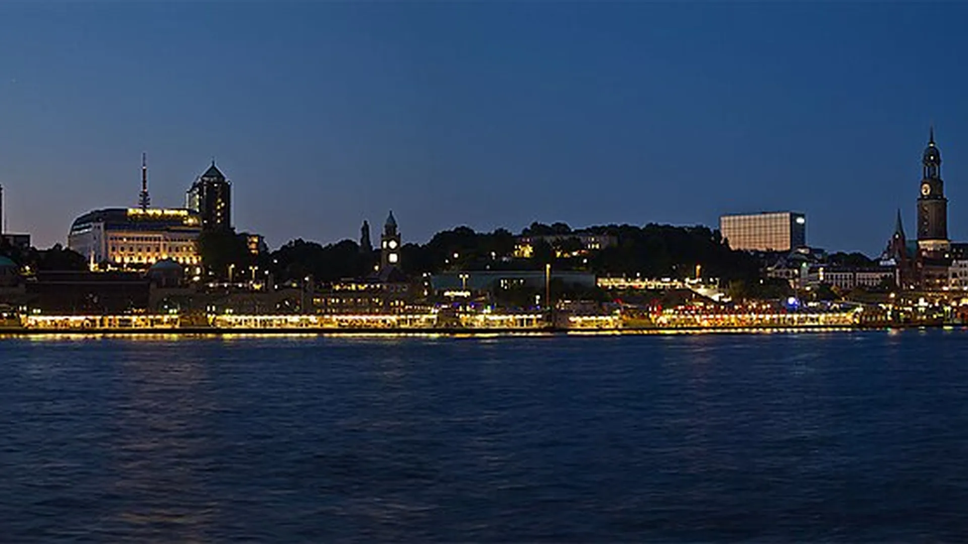 Hamburg waterfront and harbor on the Elbe at dusk