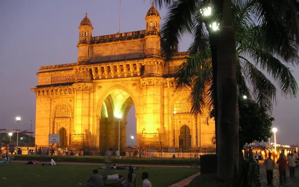 The Gateway of India in Mumbai lit up in the evening