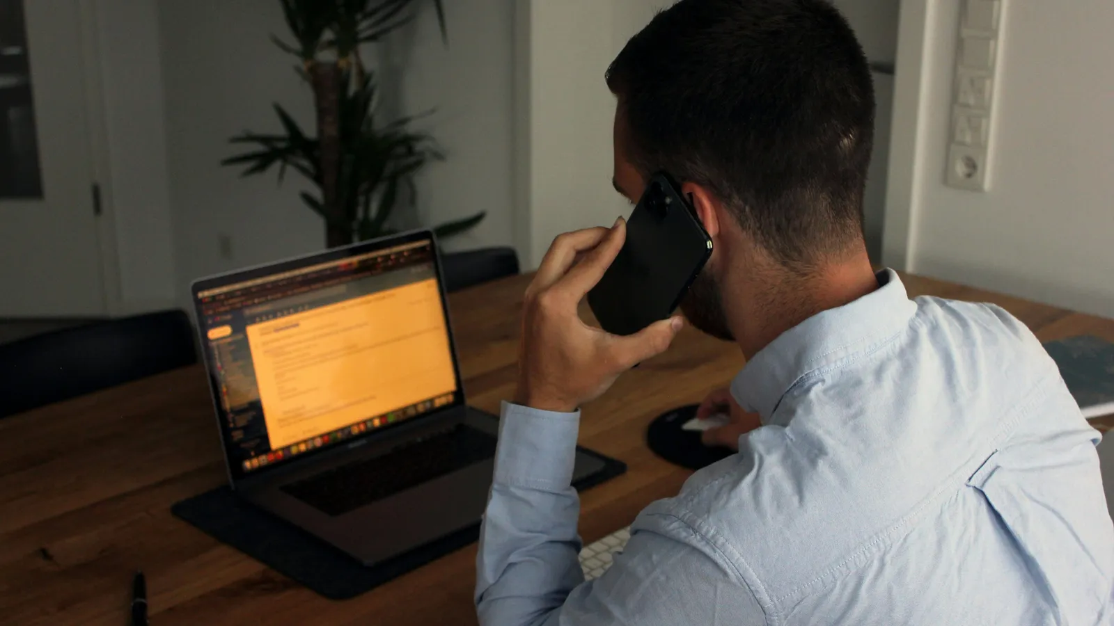 A businessman on a phone call, representing on-demand phone interpreting