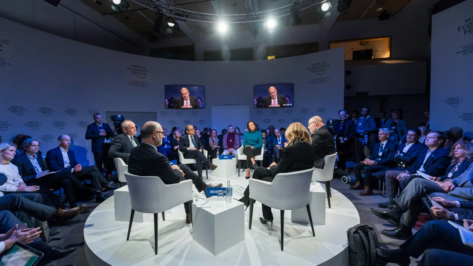 Delegates in a conference room, representing diplomatic interpreting