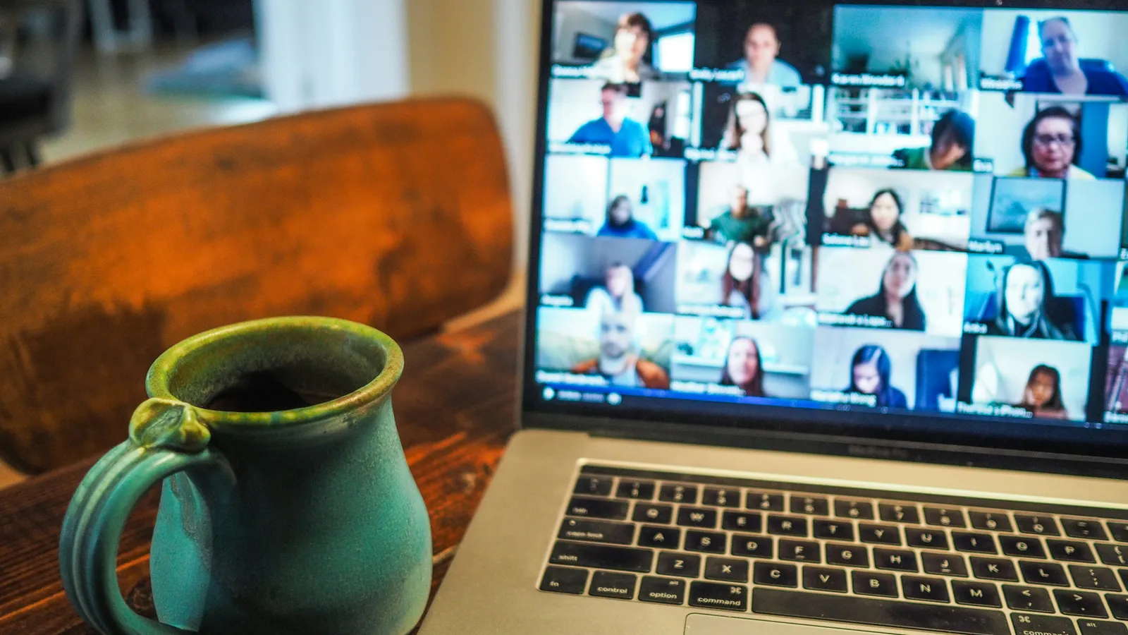 Laptop set up for a video call, representing platform-agnostic remote interpreting