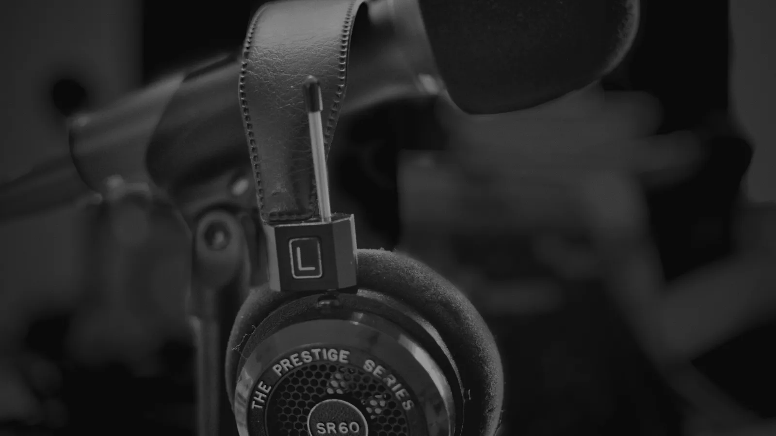 Headphones on a table, representing paired remote interpreters