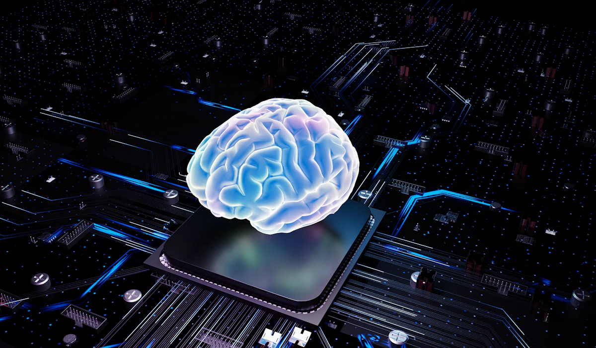 A glowing brain resting on a computer processor, representing AI