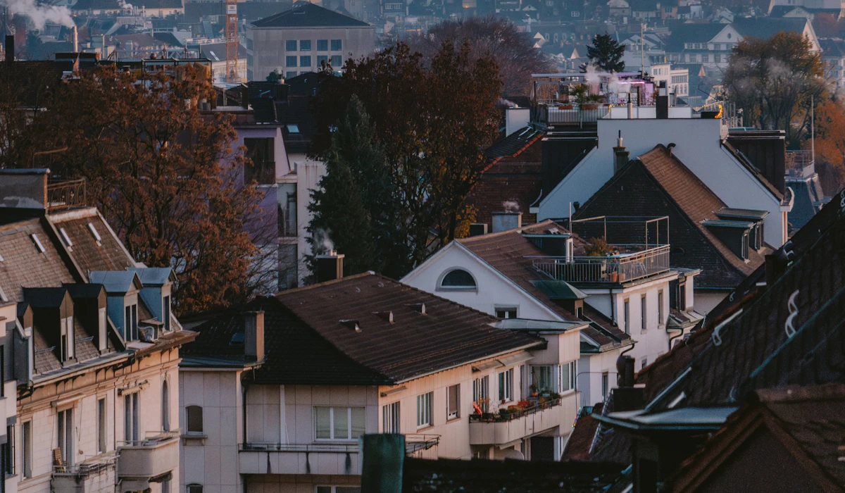 Rooftops of a Zurich neighborhood at dusk in autumn